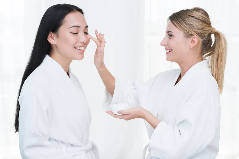 Apply a dermatologist-recommended cleanser in gentle circular motions.