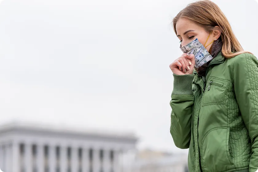 Woman smiling while adjusting air purifier for allergies after home indoor air quality testing.