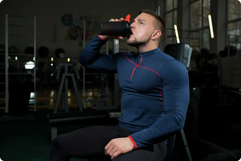 Man adding isolation work to gym workout routine for men to enhance definition.