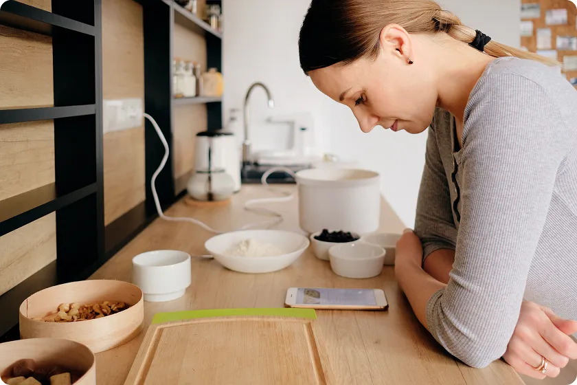 Person journaling healthy habits and diet to prevent extreme constipation symptoms naturally every day.