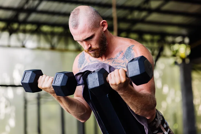 Weekly workout routine for men targeting biceps in gym schedule