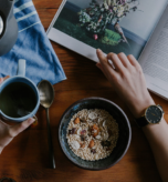 A vibrant morning scene showcasing a healthy morning routine with exercise, meditation, and a nutritious breakfast in a bright, modern setting.