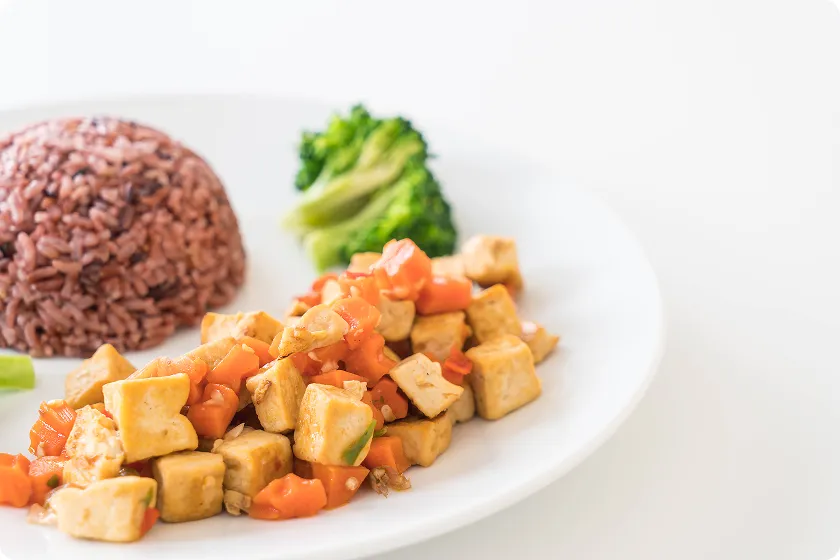 Baked salmon served with lentils representing nutritious high protein dishes.