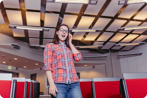 Woman planning keto diet with protein shakes while attending class