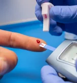 Close-up finger blood test, supporting magnesium glycinate benefits for women