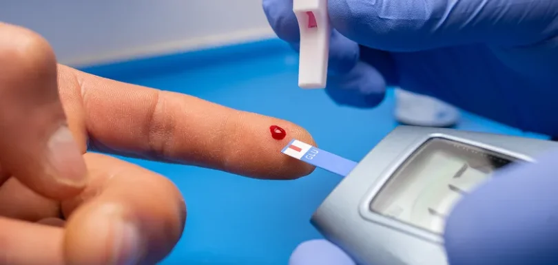 Close-up finger blood test, supporting magnesium glycinate benefits for women