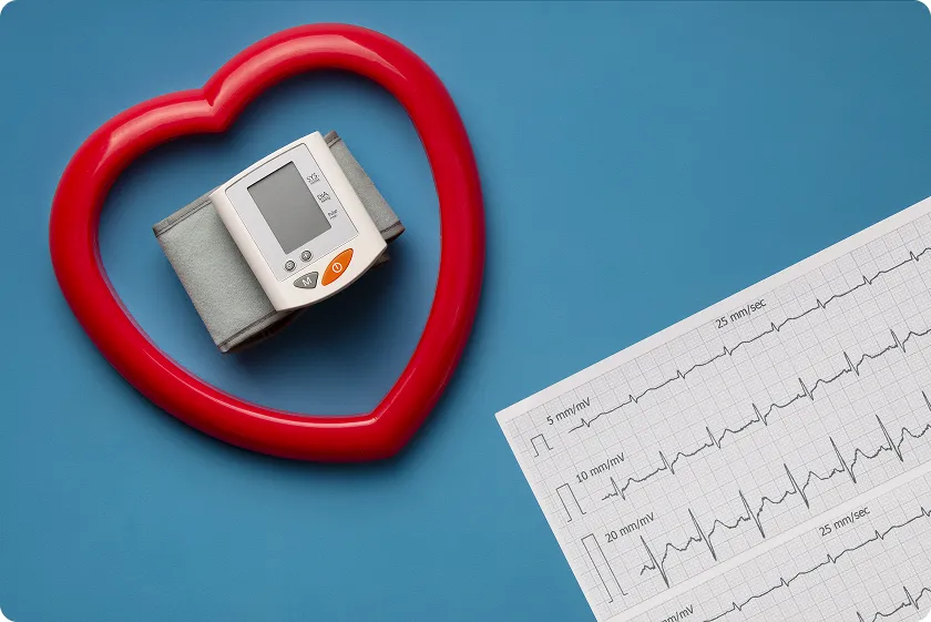 Blood pressure monitor and EKG readout showing critical heart numbers and what they mean.