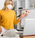 1 Masked teacher explains harmful microorganisms and infection vs disease online.