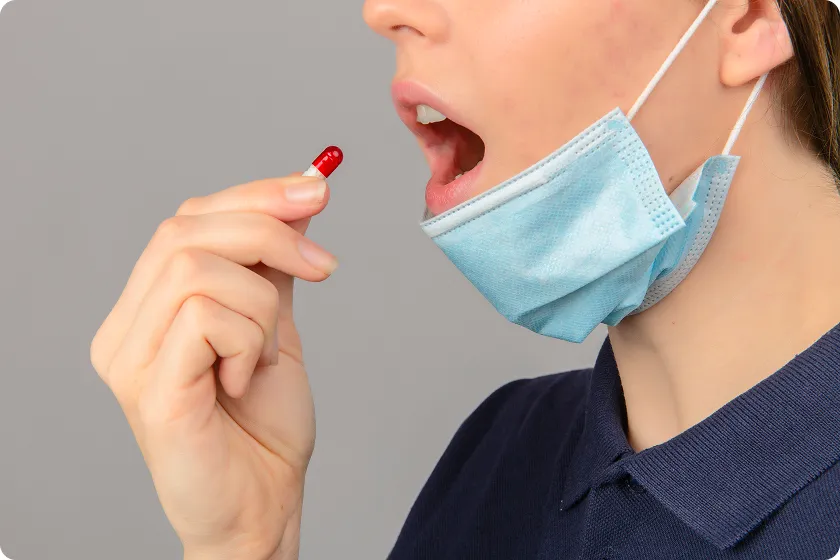 Allergist explains sublingual immunotherapy and allergy drops during consultation