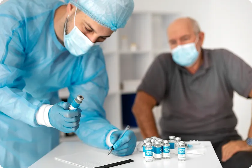 Clinician reviews quadrivalent flu vaccine paperwork before senior appointment
