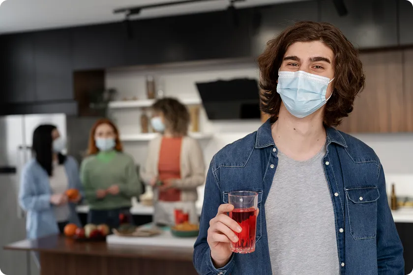 Man wearing protective face mask illustrating the first line of defense immune system.