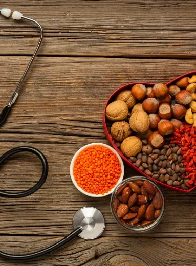1 Heart failure diet foods with nuts, lentils, and a stethoscope.