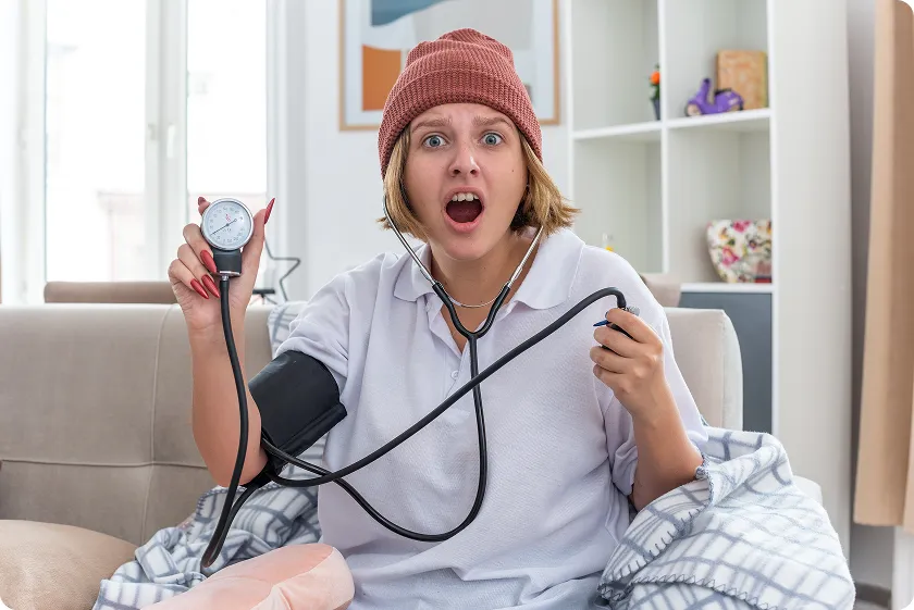 Doctor checking elderly patient’s pressure during Wegovy blood pressure monitoring visit