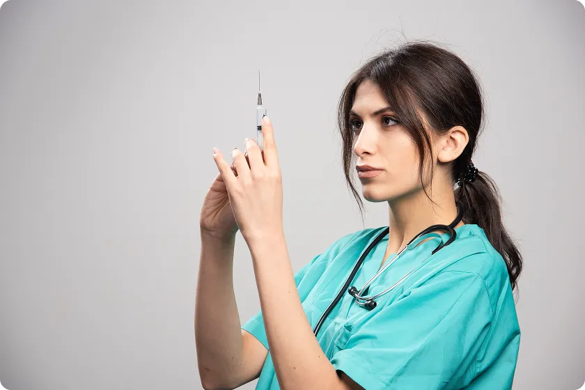Clinician discusses Evenity injection site reactions using an administration guide.