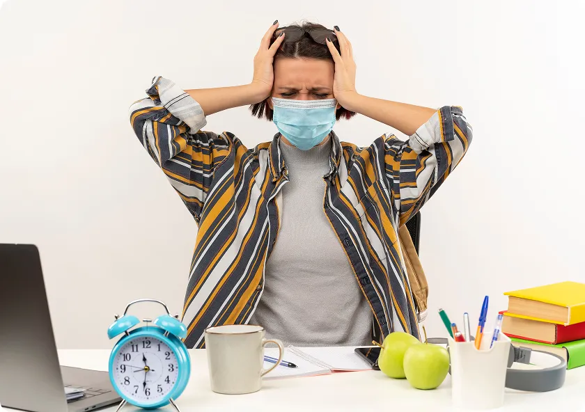 Woman practices pacing with chronic illness during remote work and recovery.