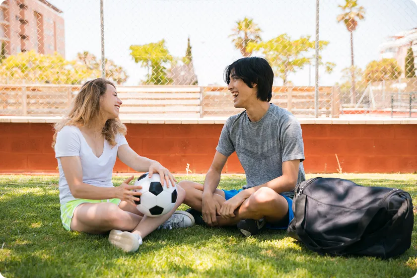 Players enjoying soccer body composition and bone health through training